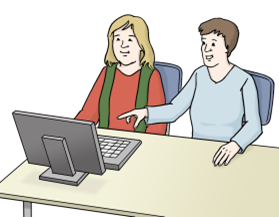 Das Bild zeigt eine Frau und einen Mann. Beide sitzen an einem Tisch. Auf dem Tisch steht ein Computer. Der Man zeigt mit dem Finger auf den Bildschirm.